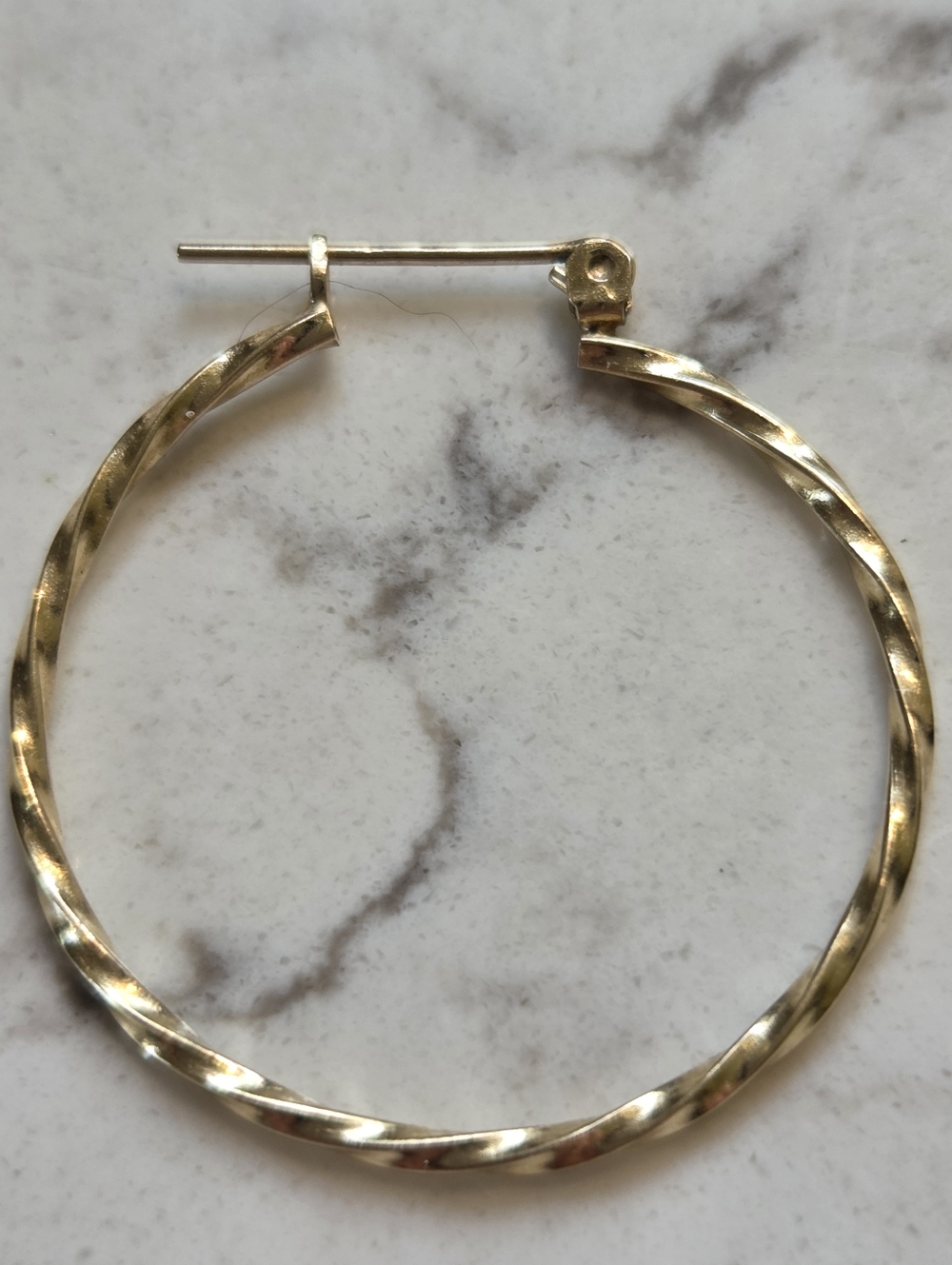 14k Gold Single Hoop Earring.